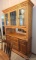 Beautiful lighted hutch stands 6-1/2' tall with adjustable glass shelf, flatware storage drawer and