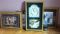 Three framed prints and a wall clock, plus a Yankee candle. Clock measures 14