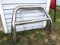 Chromed steel bumper or brush guard measures just over 3 feet wide and 37