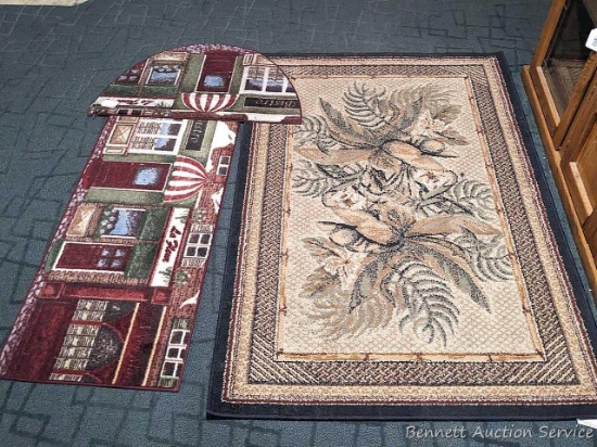 41" x 62" Tropical Bliss Spice rug, and a pair of matching kitchen rugs. All in good condition,