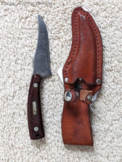 Schrade Old Timer USA Model 152 skinning knife with leather sheath. Knife measures 7".