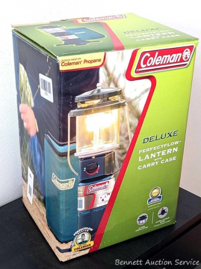 New in box Coleman Deluxe PerfectFlow lantern with carry case in original box.