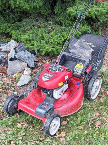 Craftsman self propelled mower with easy empty bag and wash out port. Deck is approx. 20" diameter.