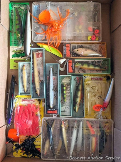 Several Rapala fishing lures, buzz baits, jigs, and more.