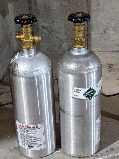 Two Carbon Dioxide Co2 cylinders for beer or whatever you want. Each about 18" tall overall.