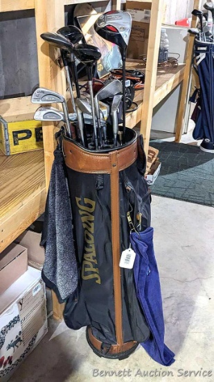 Golf clubs incl Golden Bear, Davell Acker, Orlimar, more in a Spaulding bag. Spaulding and Tru-Flite