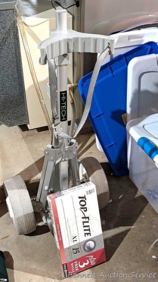 NIP Top-Flite XL 15 golf balls, and a folding Hi-Teck bag caddy about 3' when folded down.