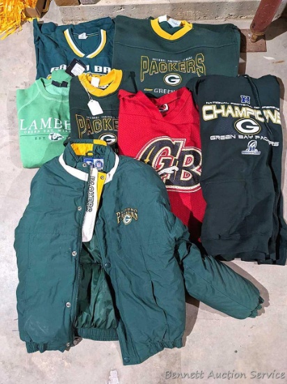 Array of Green Bay Packers apparel incl hoodie and more. Sizes as pictured.