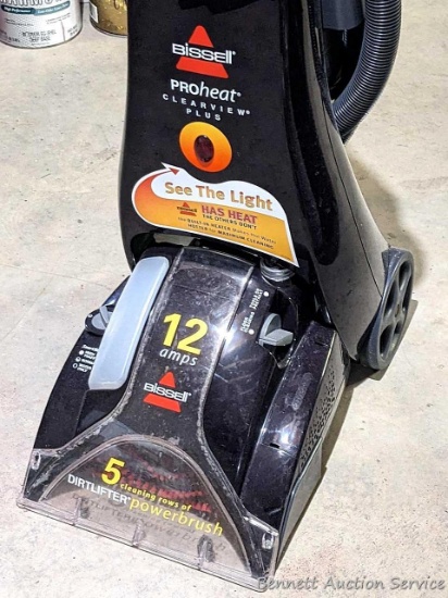 Bissel ProHeat Clearview Plus 12 amp steamer runs and picks up, about 45" tall.