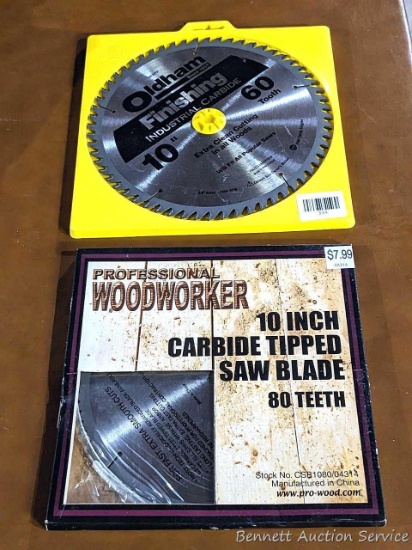 Two 10" saw blades, both appear unused. Oldham has 60 carbide teeth.