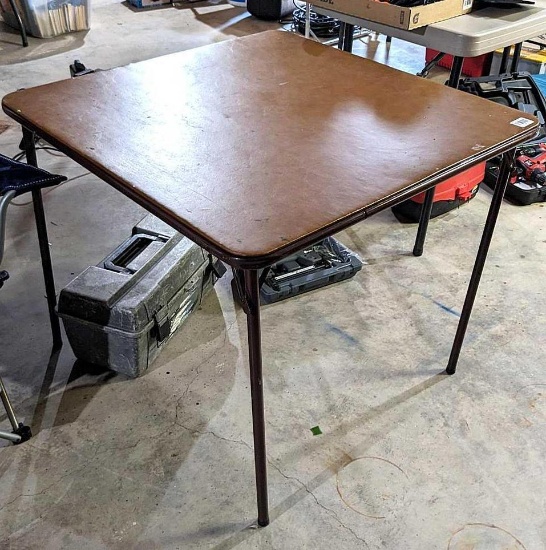 Folding card table is approx. 34" x 34" and in good condition.