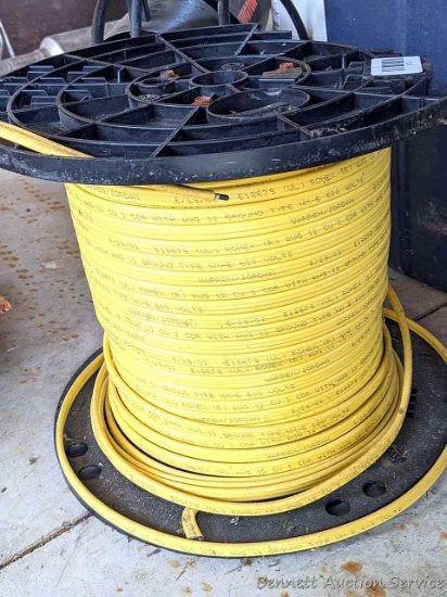 13" spool of 12 - 2 with ground copper electrical wire, the spool has about 9" of wire wound on it