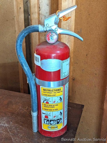 22" General brand fire extinguisher is ready to go.