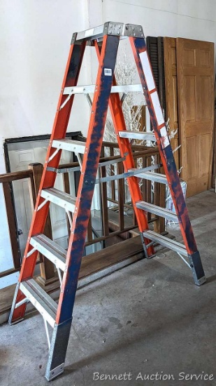 6' fiberglass step ladder is sturdy and in good condition.