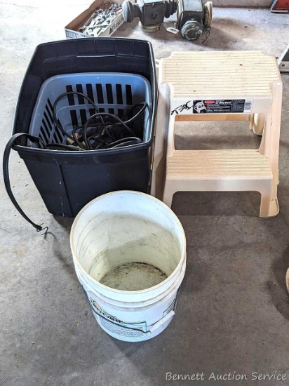 Rubbermaid step stool is 16" high and comes with a tote containing some bungee straps, etc.