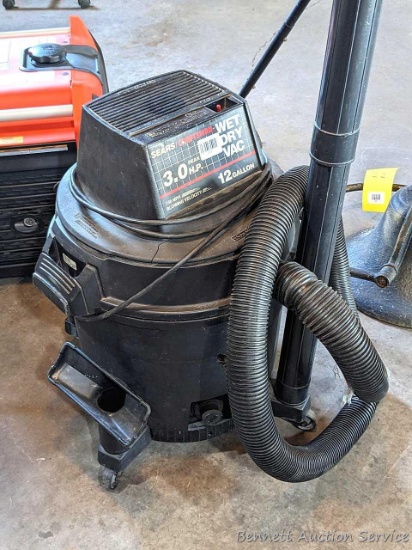 Craftsman 3 HP wet/dry 12 gallon vacuum cleaner with quite a few attachments.