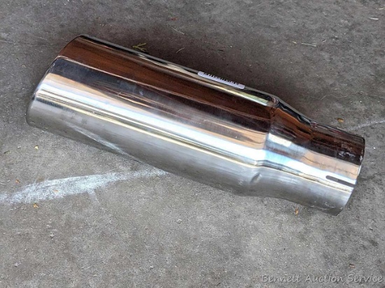 Dynomax exhaust tip with a 3-1/2" rolled end and clamps to a 4" pipe.