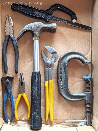Claw hammer, a few pairs of pliers, a C clamp, more.
