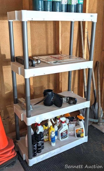 5' tall Plano plastic shelving unit is 32" x 16".