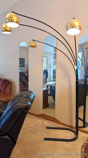 Four light floor lamp stands approx. 7' tall and is approx. 5-1/2' at widest.