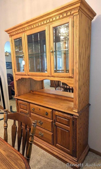 Beautiful lighted hutch stands 6-1/2' tall with adjustable glass shelf, flatware storage drawer and