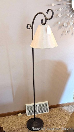 61" tall floor lamp in good condition.