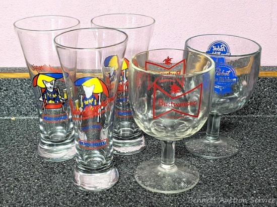 Three Bud Light beer glasses featuring Spuds Makenzie are each 7" tall; plus a Pabst Blue Ribbon and