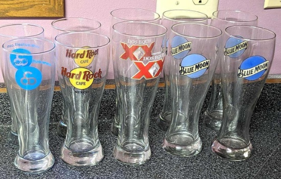Four Blue Moon, two Cerveza, two Hard Rock Cafe, two other beer glasses. Tallest are nearly 9-1/2".