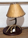 Northwoods themed antler lamp is about 20