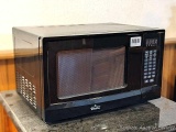 Rival microwave is in good condition, smaller size would be handy for back to school or in a