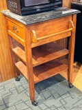 Marble topped rolling kitchen stand measures 2' x 2' x 37