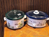 One Rival and one West Bend slow cooker. Approx. 4 and 5 quart units.