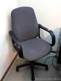 Nice rolling office chair is in good condition.