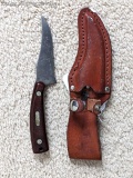 Schrade Old Timer USA Model 152 skinning knife with leather sheath. Knife measures 7