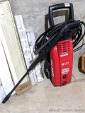 Tradesman H120 power washer with hose and wand. Looks like it's in good condition, about 3' tall.