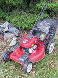 Craftsman self propelled mower with easy empty bag and wash out port. Deck is approx. 20