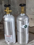 Two Carbon Dioxide Co2 cylinders for beer or whatever you want. Each about 18