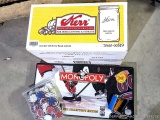 New box of twelve 32 oz mason jars with lids and rings, hockey Monopoly, poker chips, lighters.