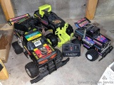 Radio Shack remote control RC cars with remotes, and a Tonka car with pull cord and no remote.