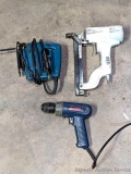 Makita jig saw, Ryobi drill, pneumatic stapler.