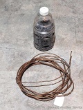 Jug about half full of lead pellets for melting down and a 8