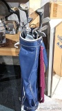 Golf clubs incl Wilson and other in a 34