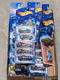 A ton of NIP Hot Wheels cars as pictured, more.