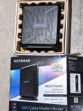 NetGear Night Hawk WiFi cable modem router comes with box and router, yellow and grey cords, black