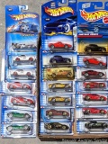 Large amount of NIP Hot Wheels cars as pictured.