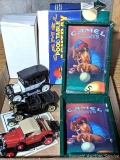Two Camel cigarette pool table ashtrays and three model cars with boxes and COAs. Cars up to about