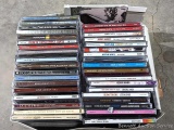 CDs incl Taylor Swift, The Animals, more. One TS missing, Elvis cd not in case, other cases