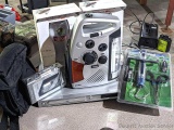 Jeep multi-functional Am/Fm receiver with lantern, vintage Sanyo stereo cassette player, and a 17