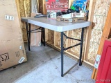 Lifetime folding 4' table. The table is in very good condition.