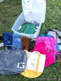 Timbuck2 bag, tote bags, traveling bags, and a clear tote.